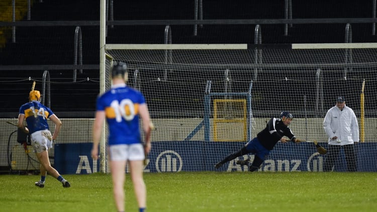 Clare goalkeeper Donal Tuohy breaks his hurley as he saves a penalty from Seamus Callanan of Tipperary during 2019 Allianz Hurling League Division 1A Round 1 match between Tipperary and Clare at Semple Stadium.