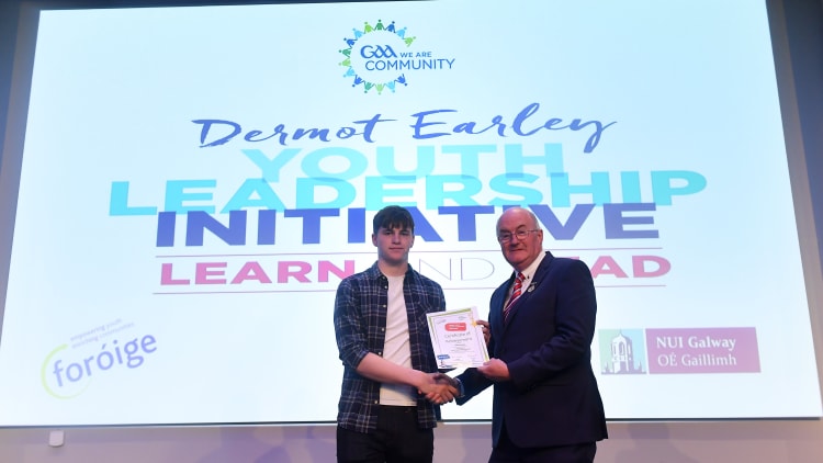 Keith Doyle receives his certificate from Uachtarán Chumann Lúthchleas Gael John Horan at the Dermot Earley Youth Leadership Recognition Day, hosted by the GAA in partnership with Foróige and NUIG. Croke Park in Dublin.