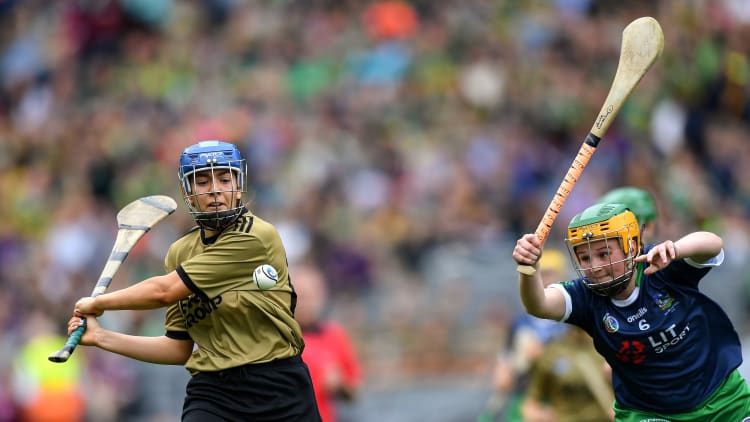 Julianne O'Keeffe, Kerry, and Aoife Coughlan, Limerick, during the All Ireland Premier Junior Camogie Final at Croke Park.