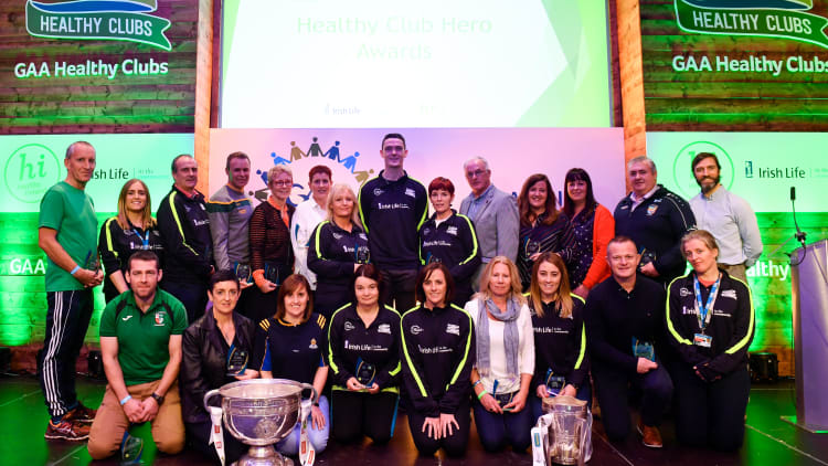 Dublin and Raheny footballer Brian Fenton, centre, with 'Hero Award' winners during the 2018 GAA National Healthy Club Conference at Croke Park Stadium, in Dublin.
