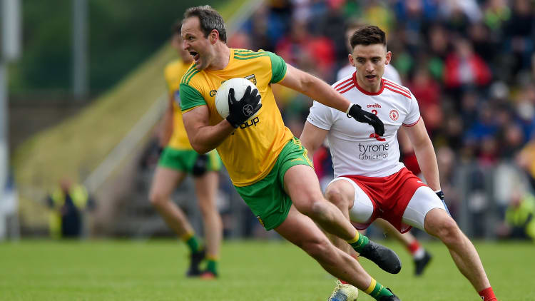 Michael Murphy of Donegal in action against Pádraig Hampsey of Tyrone during the Ulster GAA Football Senior Championship semi-final match between Donegal and Tyrone at Kingspan Breffni Park in Cavan.