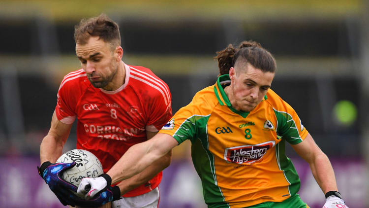 Jason Gibbons, Ballintubber, and Kieran Molloy, Corofin, during the AIB Connacht Club SFC Semi-Final at Tuam Stadium.