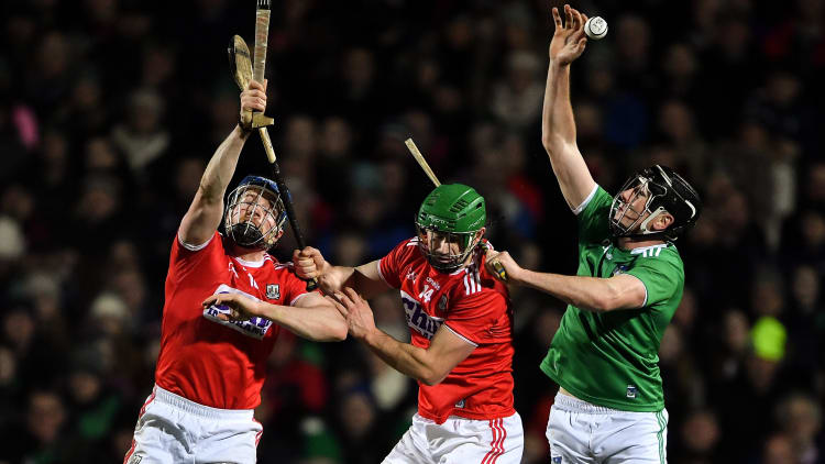 Diarmaid Byrnes of Limerick in action against Conor Lehane, left, and Séamus Harnedy of Cork during the Co-Op Superstores Munster Hurling League Final match between Limerick and Cork at LIT Gaelic Grounds in Limerick.