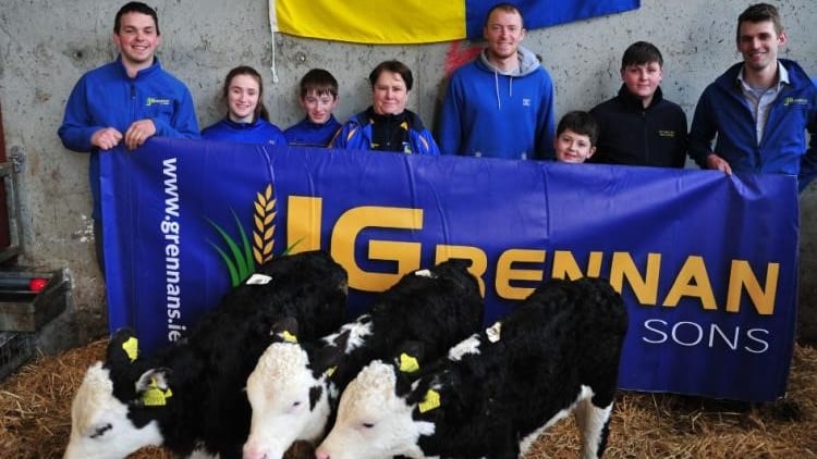 Colin Anderson and John Kelly of J Grennan and Sons Animal Feeds, Birr, sponsors of Calf Milk Replacer for Carrickedmond GAA Club's unique fundraiser, pictured with club officials and supporters.