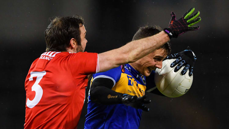 Conor Sweeney, Tipperary, and James Loughrey, Cork, in Allianz Football League Division Three action at Semple Stadium.