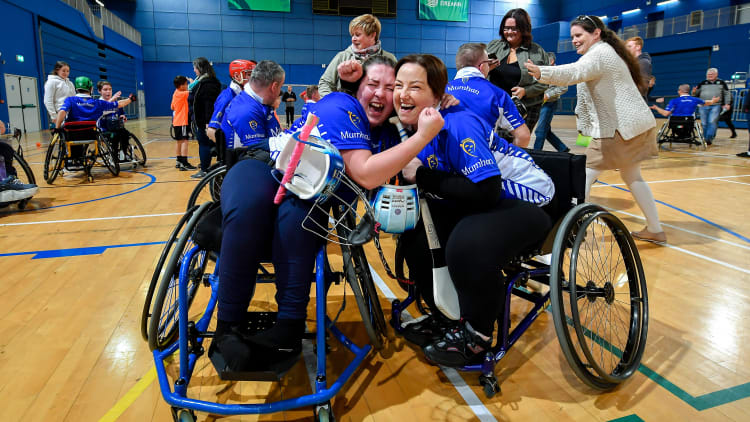 Ellie Sheehy, left, and Caroline O'Hanlon of Munster celebrate after defeating Leinster during the M.Donnelly GAA Wheelchair Hurling All-Ireland Finals at National Indoor Arena in Abbotstown, Dublin.