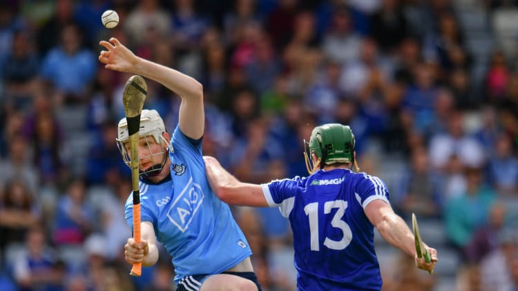 Shane Barrett, Dublin, and Willie Dunphy, Laois, during the 2019 All Ireland SHC preliminary quarter-final at MW Hire O'Moore Park.