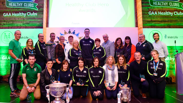 Dublin and Raheny footballer Brian Fenton, centre, with 'Hero Award' winners during the 2018 GAA National Healthy Club Conference at Croke Park Stadium, in Dublin.