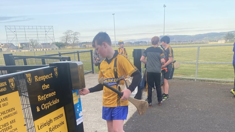 Ballycastle juvenile players use the newly installed automatic hand-sanitiser dispenser at their grounds.