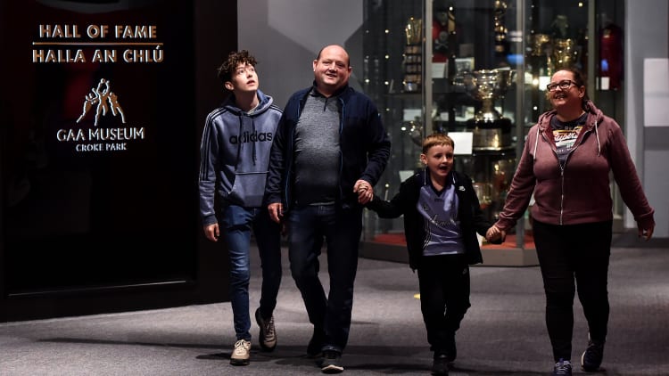 The Davis family, from left, Dylan, Gary, Ethan, and Tara Davis, from Kinnegad in Westmeath, walk though the GAA Museum at Croke Park.