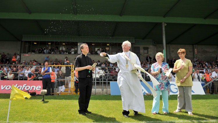 Bishop Christopher Jones blesses the new stand in Markievicz Park during half-time of the Sligo-Galway 2009 Connacht Senior Football Championship semi-final.
