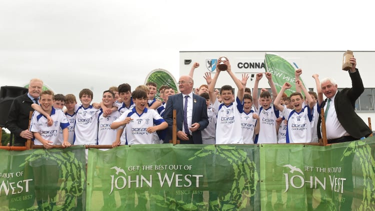Cian Boran, Naas captain, lifts the Canon Fogarty Trophy after the Division 2 Hurling final at the John West Féile na nGael 2018.