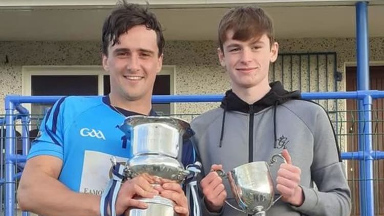 Longford Slashers senior team captain, Cian Kavanagh, and and U15 team captain, Darryl Swaris, photographed together with the Cups after their County Hurling Final wins on Sunday.