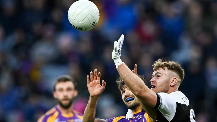 Aaron Morgan, Kilcoo, and Ben Shovlin, Kilmacud Crokes, during the AIB All Ireland Club SFC Final at Croke Park.