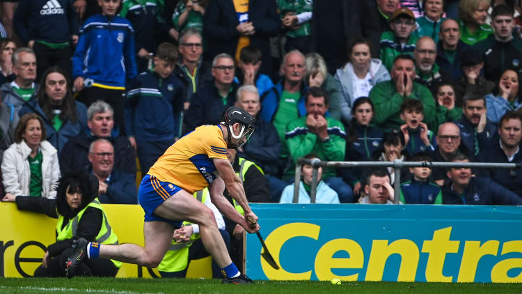Tony Kelly of Clare scores a point from a sideline cut, with the last score of the second half to equalise and send the match to extra-time, during the Munster GAA Hurling Senior Championship Final match between Limerick and Clare at FBD Semple Stadium in Thurles, Tipperary.