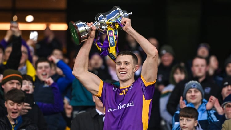 Paul Mannion of Kilmacud Crokes lifts the Andy Merrigan Cup after his side's victory in the AIB GAA Football All-Ireland Senior Club Championship Final match between Watty Graham's Glen of Derry and Kilmacud Crokes of Dublin at Croke Park in Dublin.