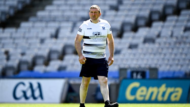 Monaghan manager Arthur Hughes patrols the turf in Croke Park before the Lory Meagher Cup final between Monaghan and Lancashire yesterday.