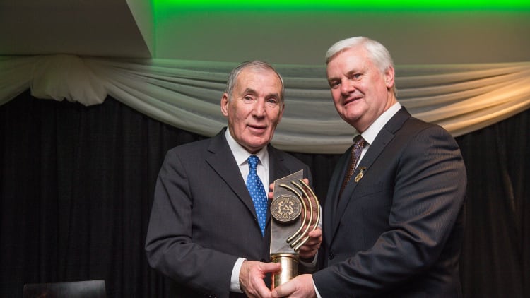 Weeshie Fogarty (l) presented with his MacNamee Hall of Fame Award by former Uachtarán Chumann Lúthchleas Gael, Aogán Ó Fearghail, in 2016.