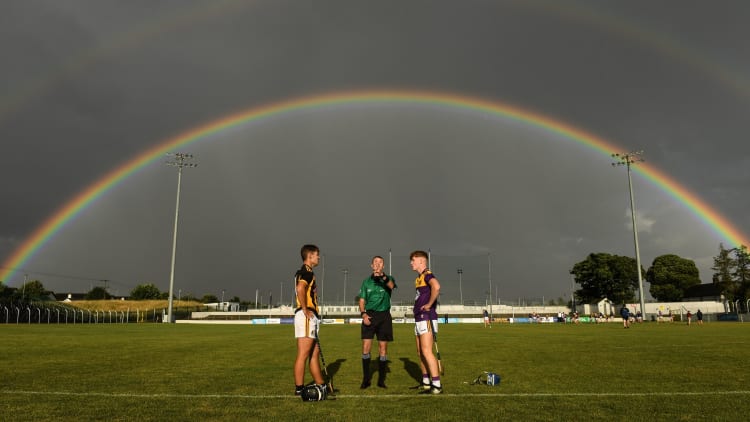 Referee Thomas Gleeson with Kilkenny captain Harry Shine and Wexford captain Luke Murphy during the coin toss before the 2021 Electric Ireland Leinster Minor Hurling Championship Final match between Kilkenny and Wexford at Netwatch Cullen Park in Carlow.