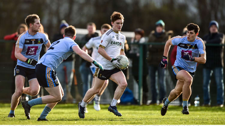 University Ulster's Dailaigh Jones on the attack against UCD at Belfield.