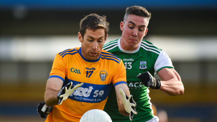 Gary Brennan, Clare, and Stephen McGullion, Fermanagh, in Allianz Football League action at Cusack Park.