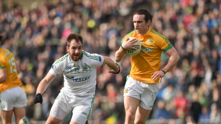 Cillian O'Sullivan, Meath, and Sean Quigley, Fermanagh, in Allianz Football League Division Two action at Pairc Tailteann.