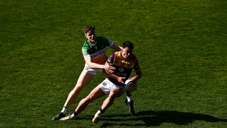 Eoghan Nolan, Wexford, and Johnny Moloney, Offaly, in Leinster SFC action.