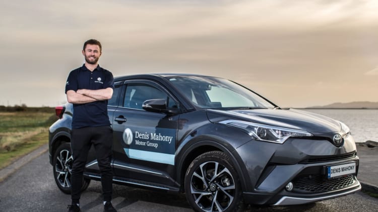 Denis Mahony Toyota Brand Ambassador and Dublin Footballer Jack McCaffrey pictured with his Toyota C-HR. Discover the range of new Toyota Hybrids and 201 offers at Denis Mahony Kilbarrack & M50.