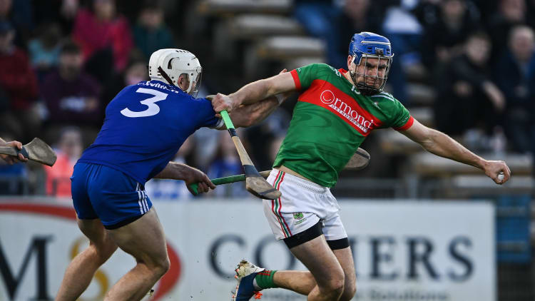 John McGrath of Loughmore/Castleiney is tackled by Pádraic Maher of Thurles Sarsfields during the Tipperary County Senior Club Hurling Championship Final match between Thurles Sarsfields and Loughmore/Castleiney at Semple Stadium in Thurles, Tipperary.