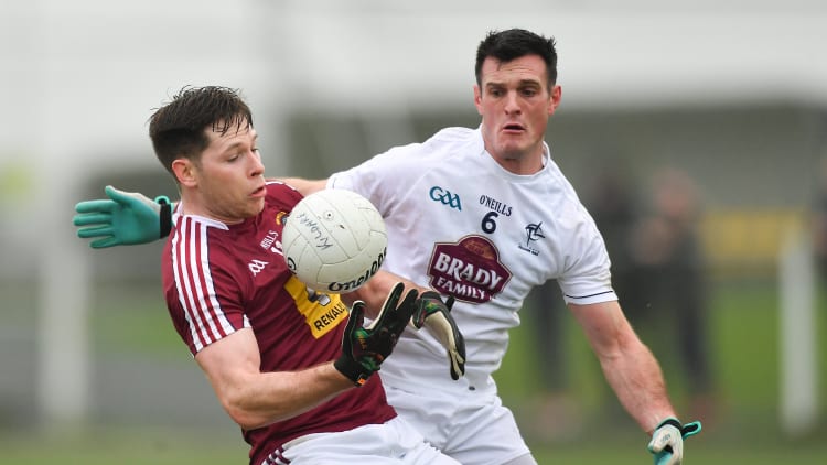 Callum McCormack, Westmeath, and Eoin Doyle, Kildare, collide at The Downs GAA Club.