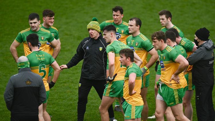 Donegal manager, Declan Bonner, speaks to his players during a water-break in their Ulster SFC semi-final victory over Armagh.