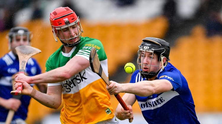 Eoghan Cahill of Offaly in action against Donnchadh Hartnett of Laois during the Walsh Cup Group 2 Round 3 match between Offaly and Laois at Glenisk O'Connor Park in Tullamore, Offaly.