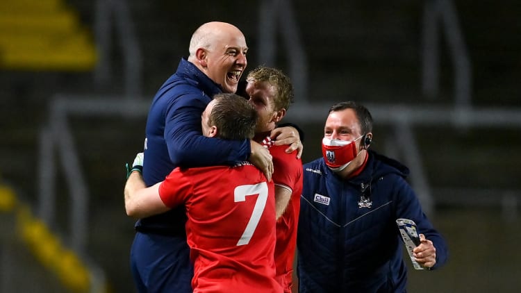 Cork manager Ronan McCarthy celebrates with Mattie Taylor and Ruairi Deane at the final whistle after victory over Kerry in the Munster GAA Football Senior Championship Semi-Final match at Páirc Uí Chaoimh in Cork.