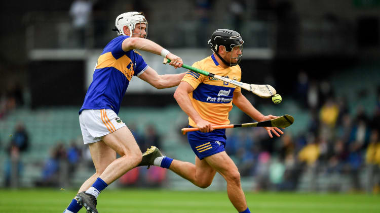 David Reidy, Clare, and Brendan Maher, Tipperary, during the Munster SHC semi-final at the LIT Gaelic Grounds.